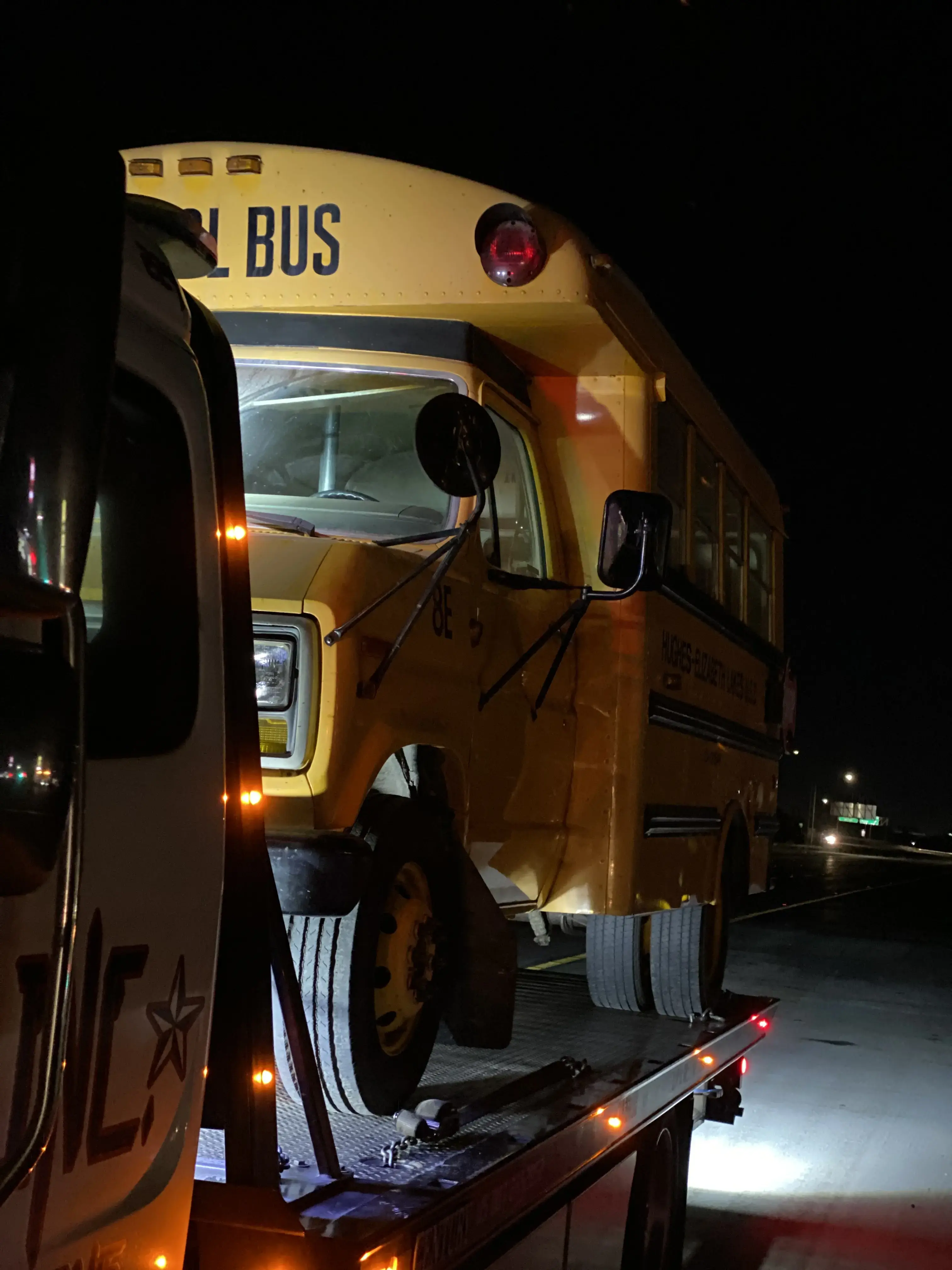 All Star heavy wrecker towing a passenger bus.