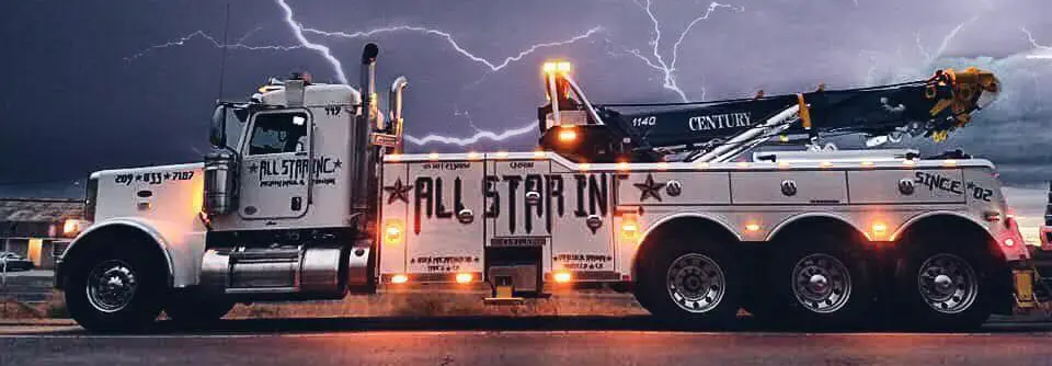 All Star 35-ton rotator on a heavy duty tow.