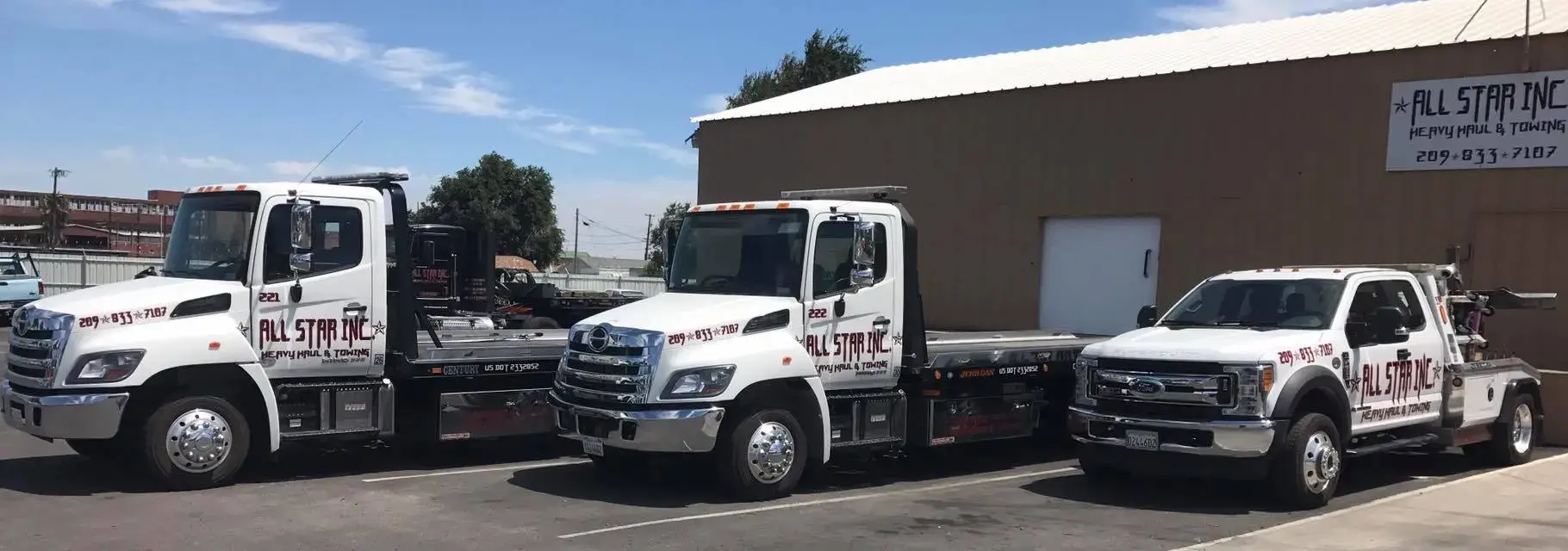 All Star Heavy Haul & Towing fleet lined up at the Tracy yard.