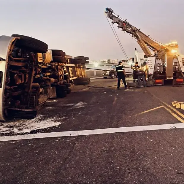 All Star heavy wrecker working a rollover recovery scene in Tracy.
