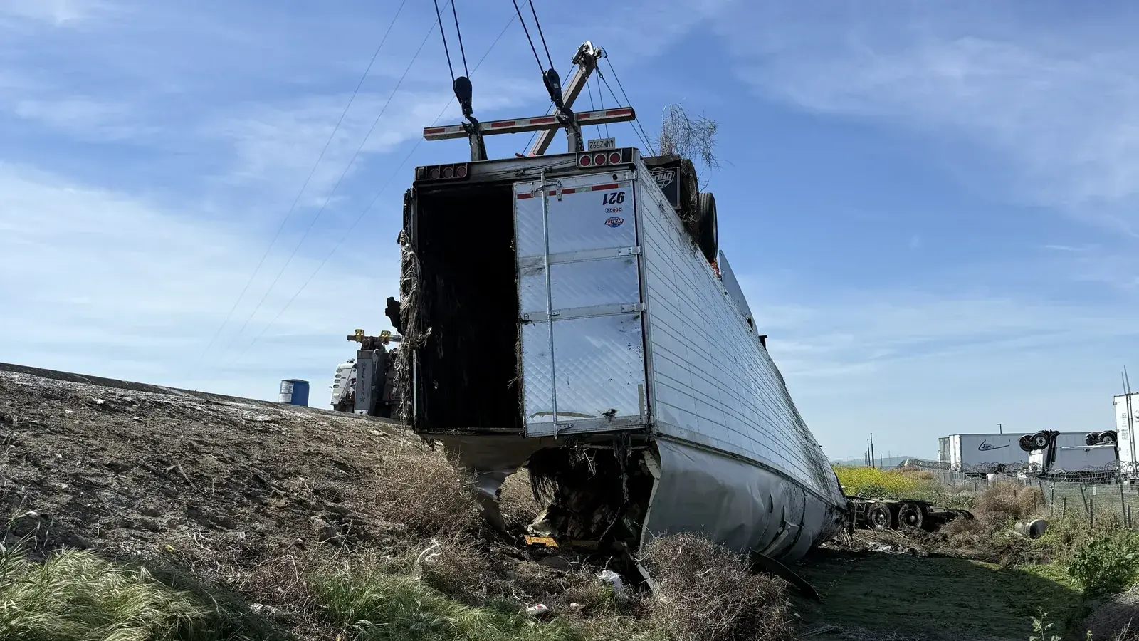 All Star heavy recovery crew working a semi rollover scene.