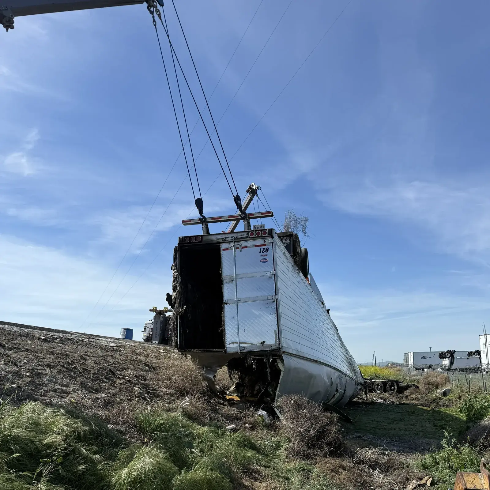 All Star heavy wrecker performing a ditch recovery winch-out.