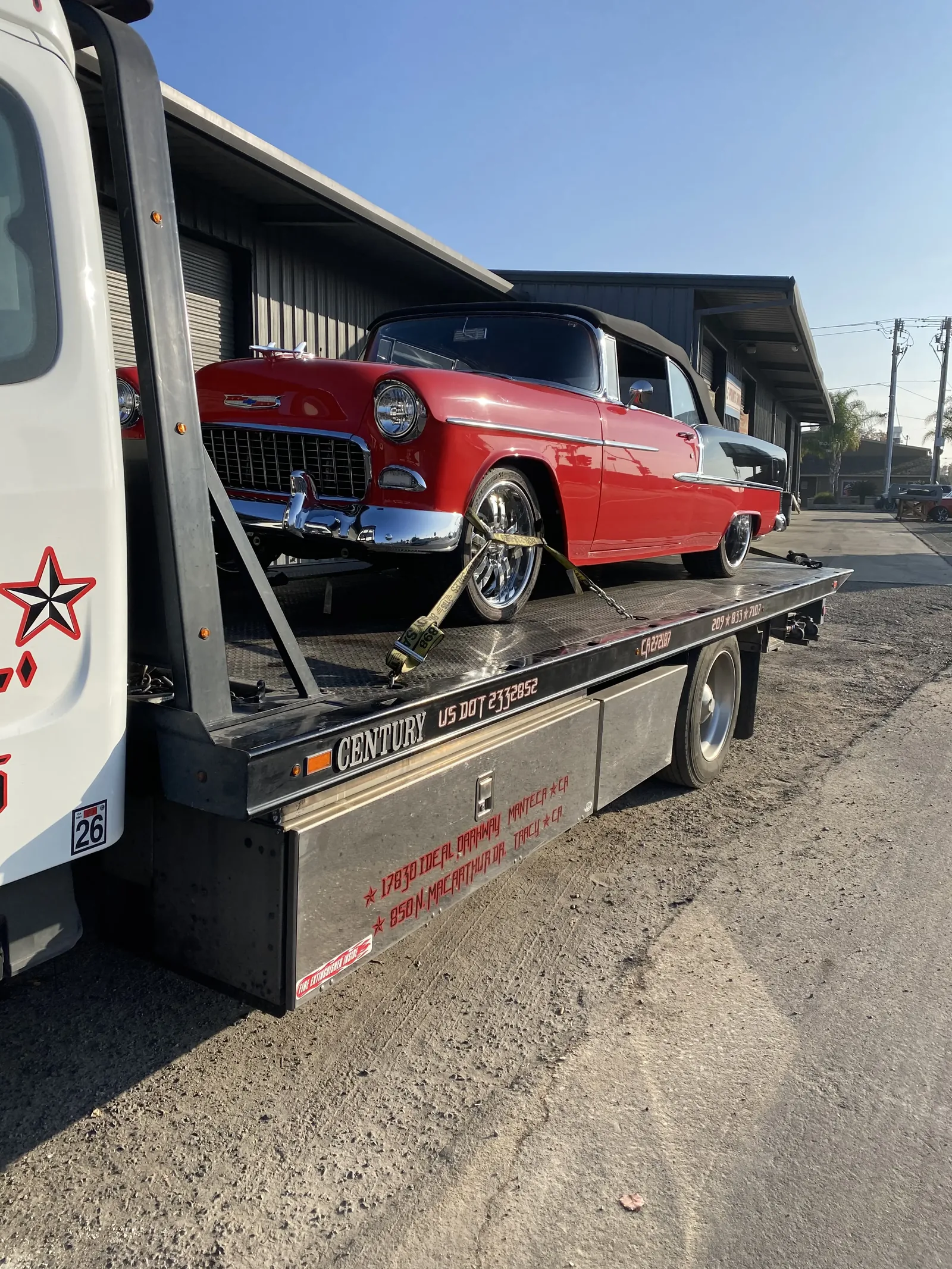 Classic car loaded for transport on an All Star carrier.