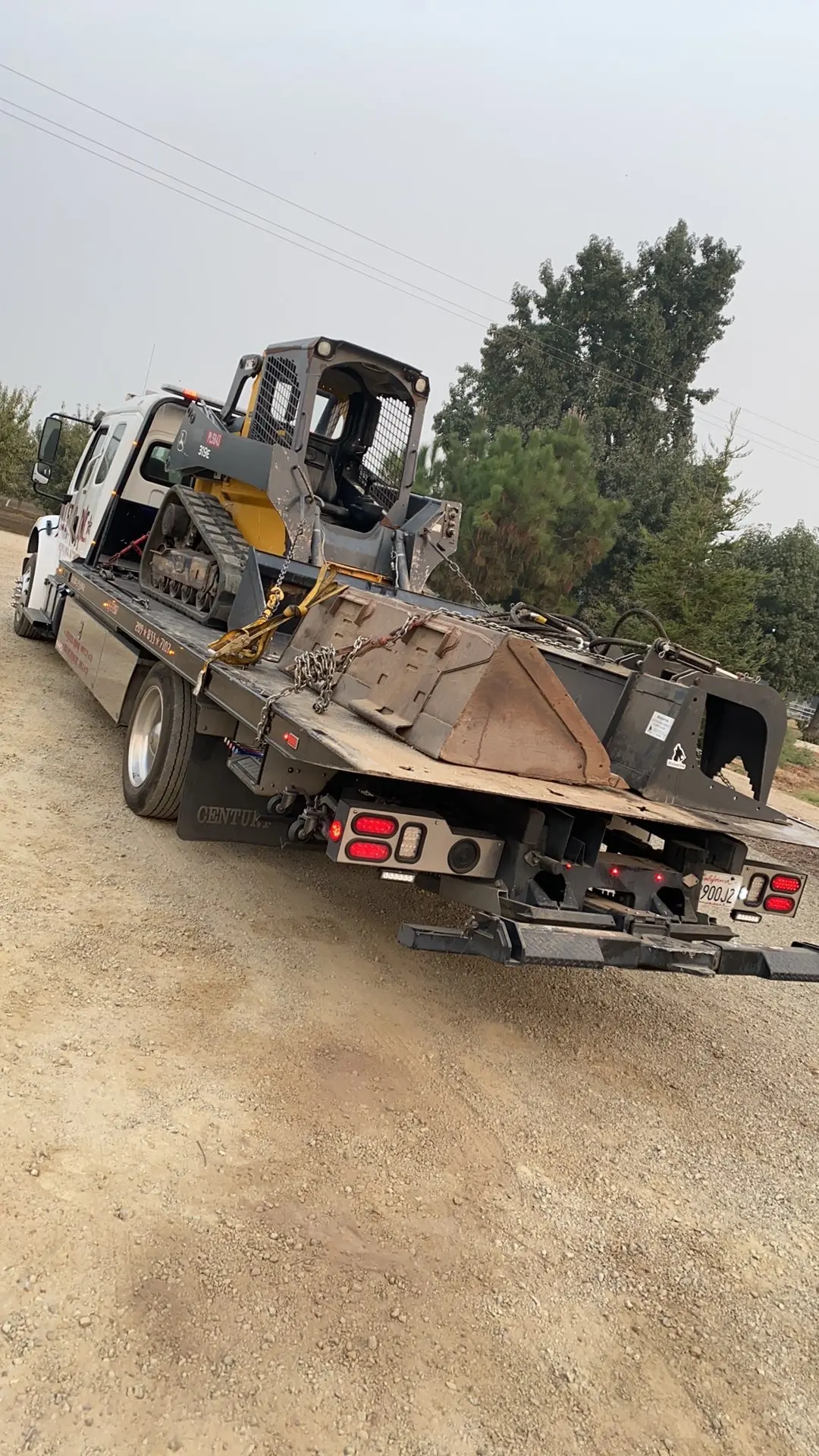 Industrial equipment loaded and secured for All Star heavy transport.