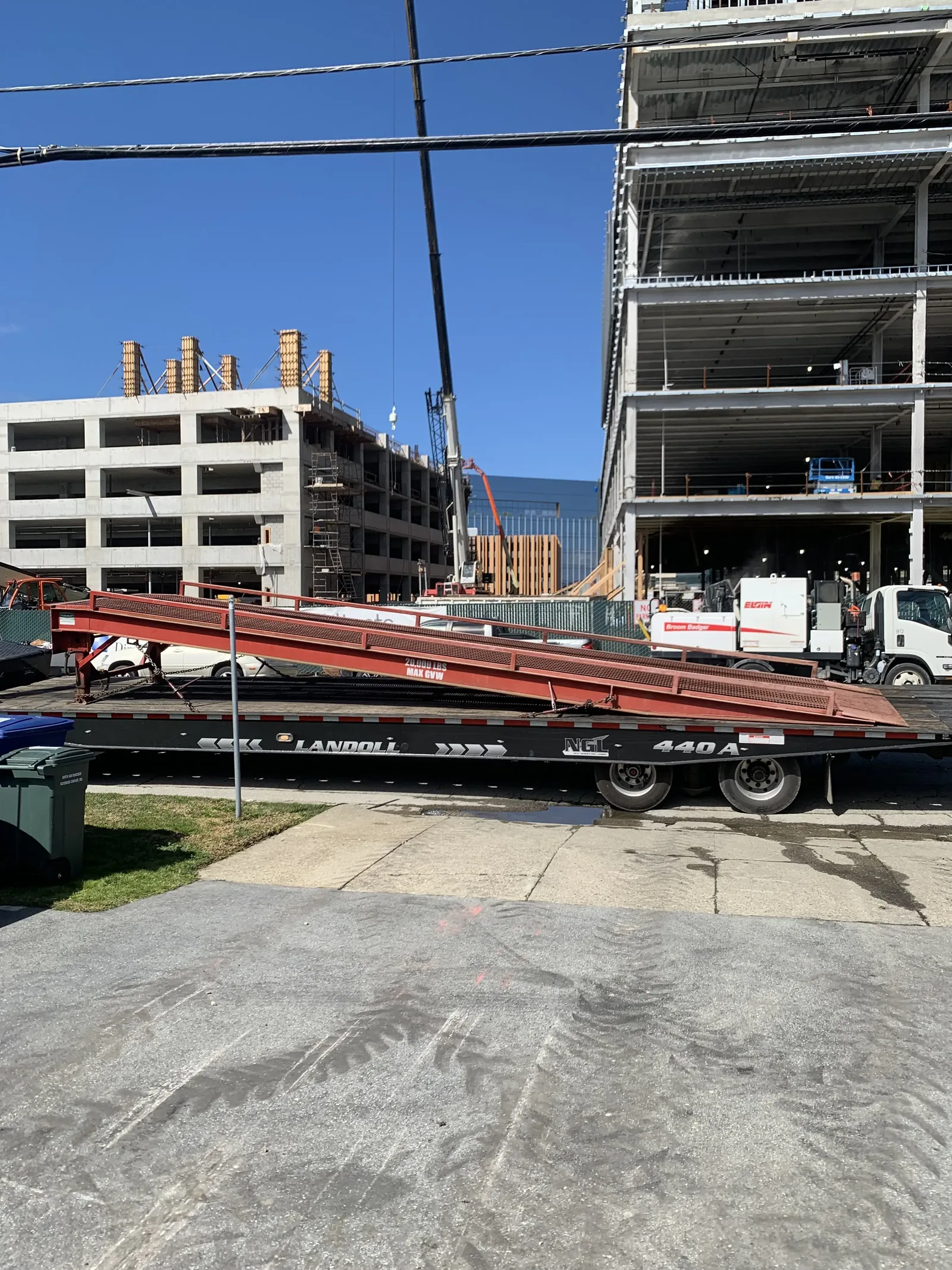 Heavy equipment loaded onto a lowboy trailer for All Star transport.