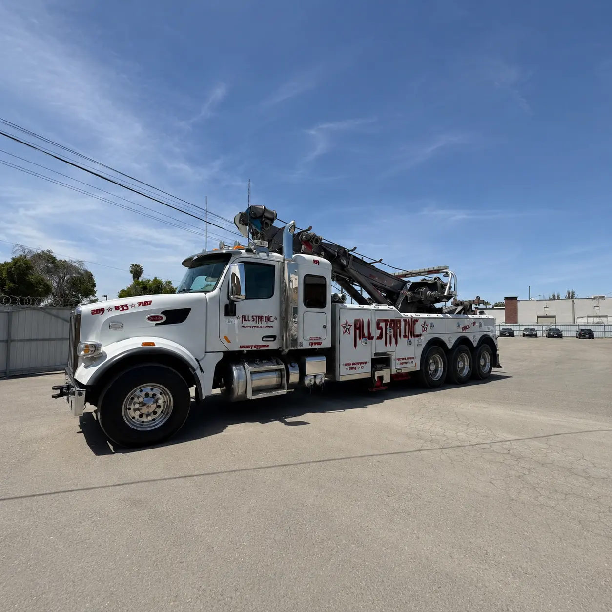 All Star heavy hauler in transit with a commercial load.